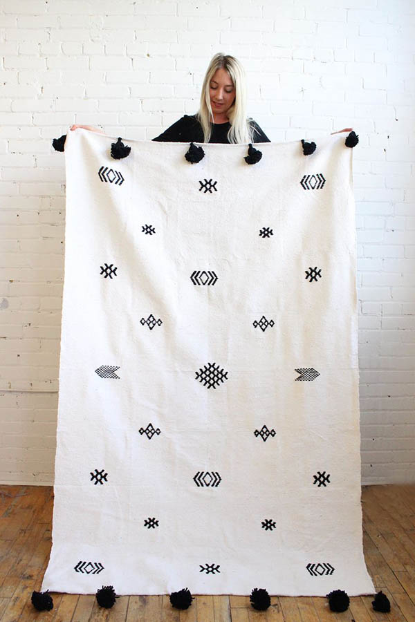 pompom throw black and white moroccan blanket
