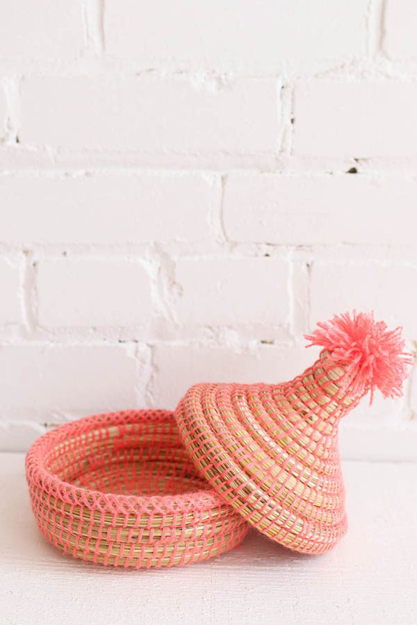 mini basket with pompom handmade in Morocco available at Baba Souk