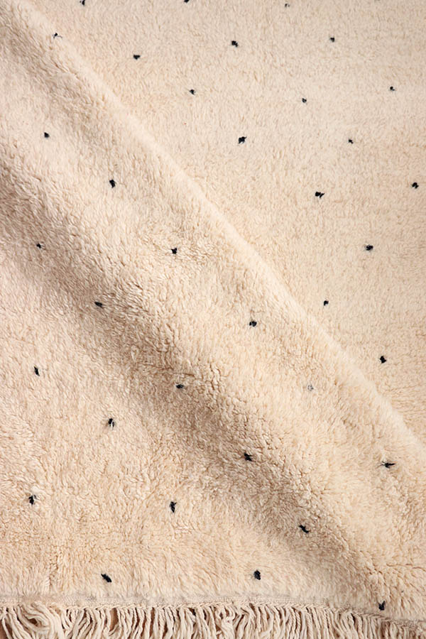 classic beni ourain rug with black dots available at baba souk