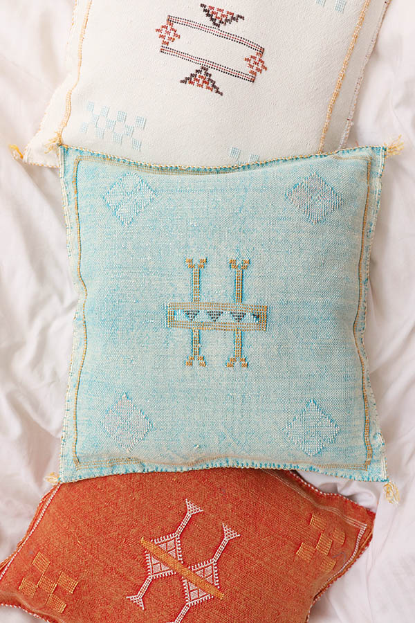 turquoise moroccan pillow available at baba souk