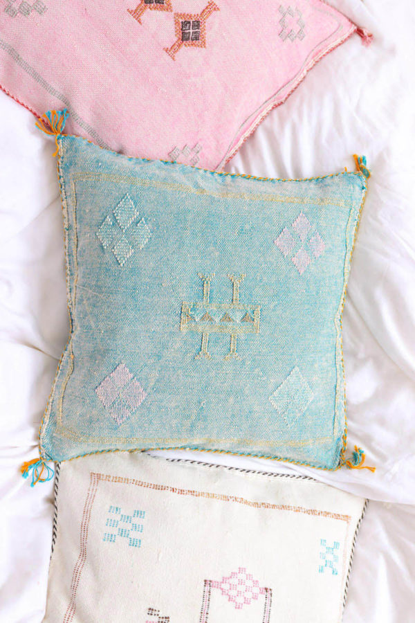 turquoise moroccan pillow available at baba souk