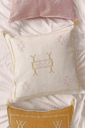 off white sabra silk pillow available at baba souk