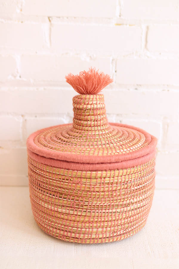 moroccan lidded basket with white pompom available at baba souk