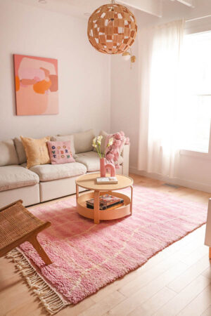 pink Moroccan rug with Julia Naima original painting